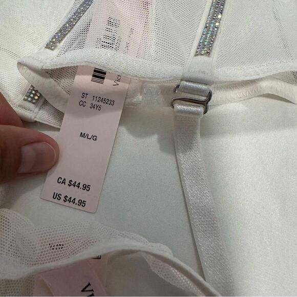 Victoria’s Secret Sheer Shine Waist-Cinching Garter Belt
And Thong Set - Picture 9 of 9